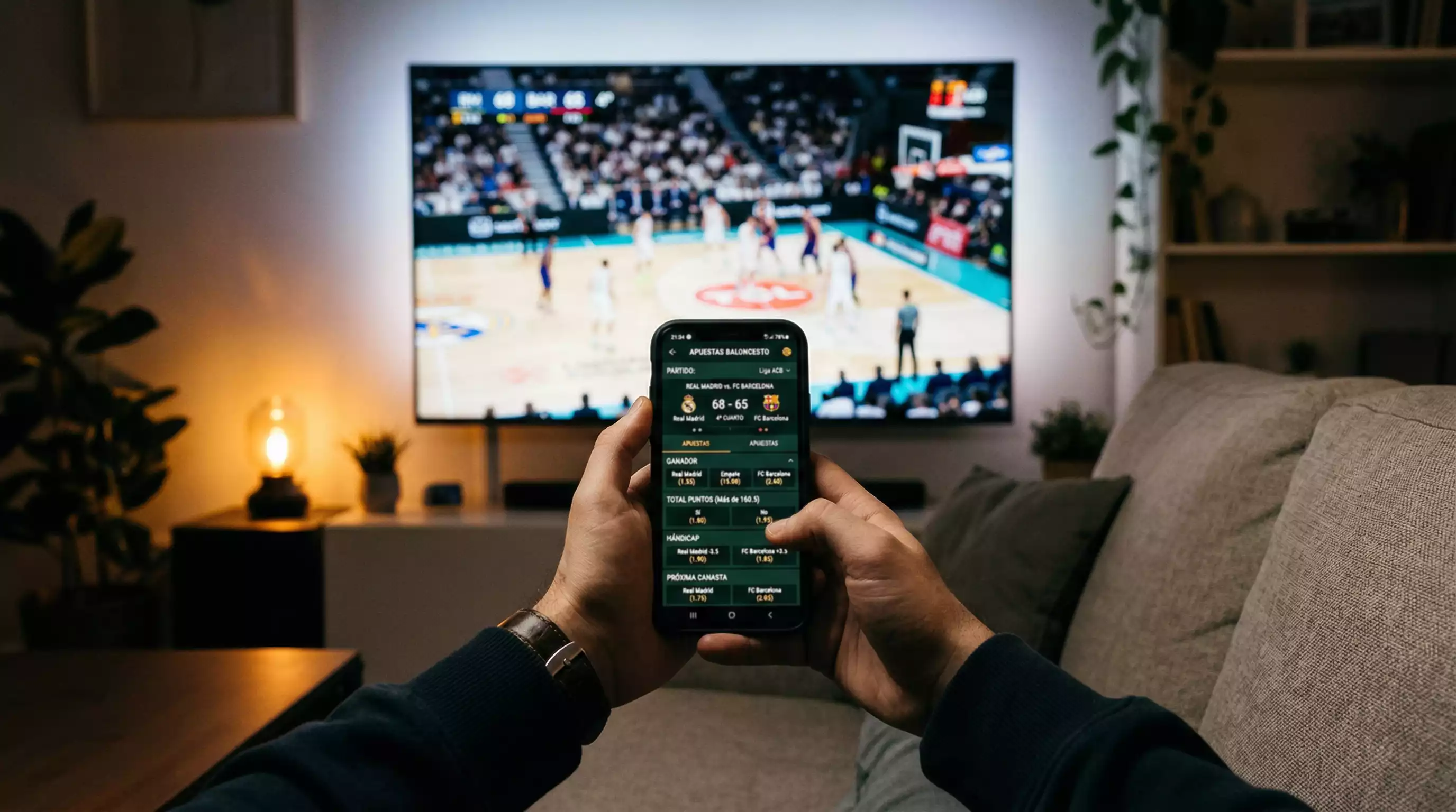 Apuestas en vivo NBA: pantalla con partido de baloncesto en directo